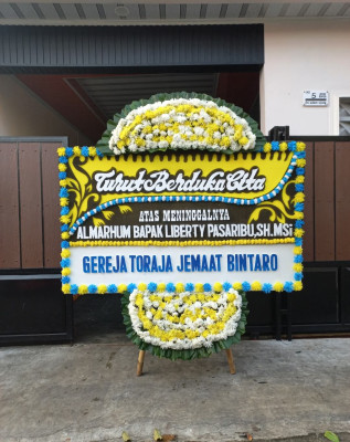 Papan Bunga Duka di Rawabuntu